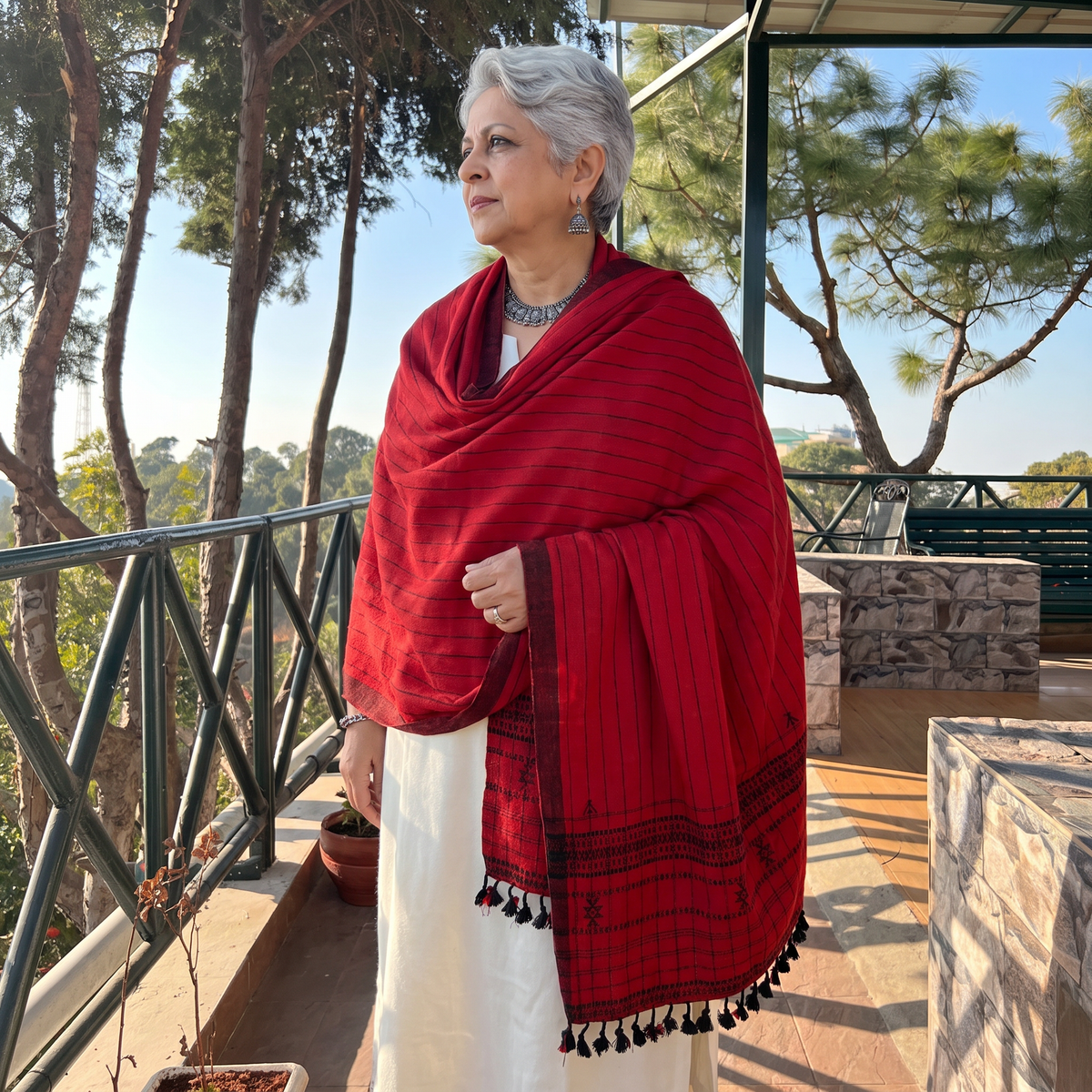 Red Kutch Bhujodi Handwoven Merino Wool Shawl, worn by a model, AI visual of the shawl, iTokri