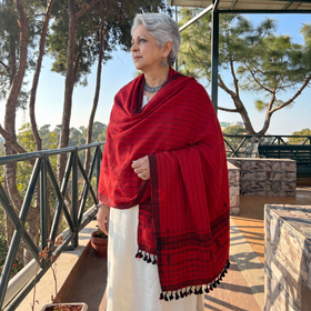 Red Kutch Bhujodi Handwoven Merino Wool Shawl, worn by a model, AI visual of the shawl, iTokri