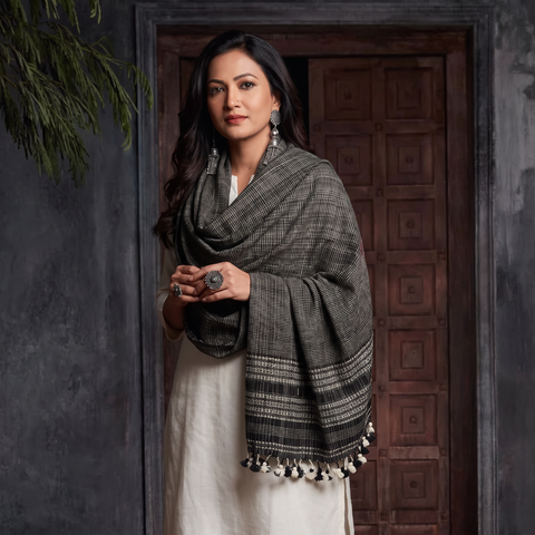 Black Kutch Bhujodi Handwoven Merino Wool Shawl, worn by a model, AI visual of the shawl, iTokri