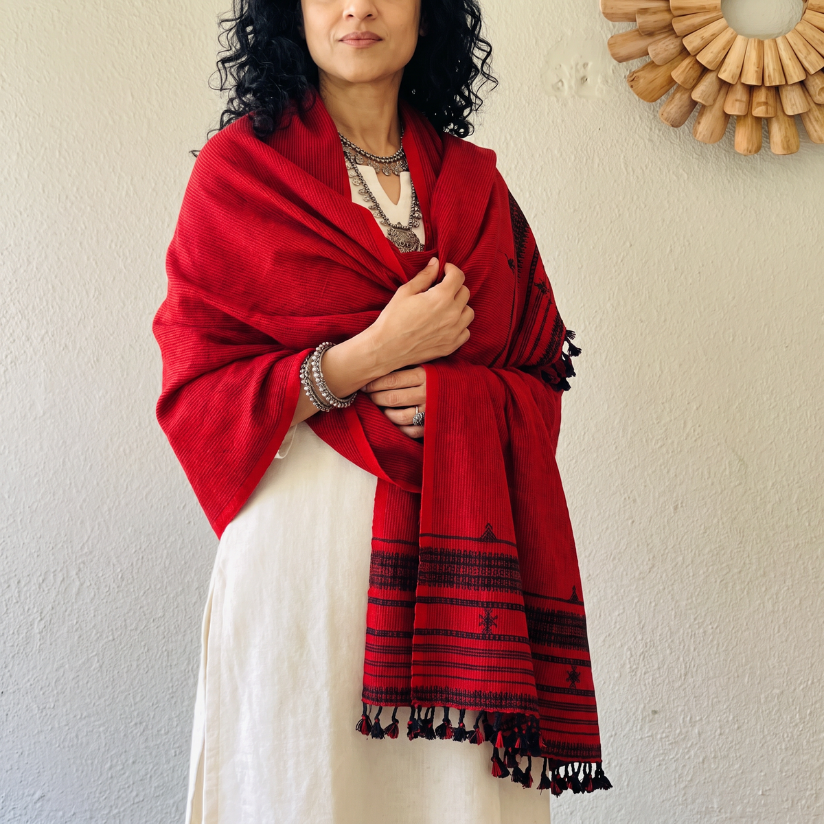 Red Kutch Bhujodi Handwoven Merino Wool Shawl, worn by a model, AI visual of the shawl, iTokri