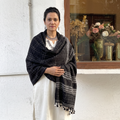 Black Kutch Bhujodi Handwoven Merino Wool Shawl, worn by a model, AI visual of the shawl, iTokri