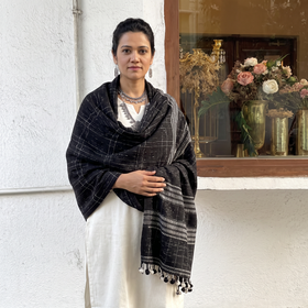 Black Kutch Bhujodi Handwoven Merino Wool Shawl, worn by a model, AI visual of the shawl, iTokri