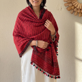 Red Kutch Bhujodi Handwoven Merino Wool Shawl, worn by a model, AI visual of the shawl, iTokri