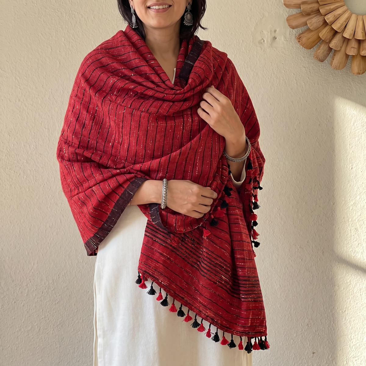 Red Kutch Bhujodi Handwoven Merino Wool Shawl, worn by a model, AI visual of the shawl, iTokri