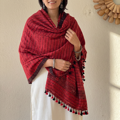 Red Kutch Bhujodi Handwoven Merino Wool Shawl, worn by a model, AI visual of the shawl, iTokri