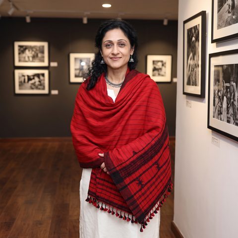Red Kutch Bhujodi Handwoven Merino Wool Shawl, worn by a model, AI visual of the shawl, iTokri