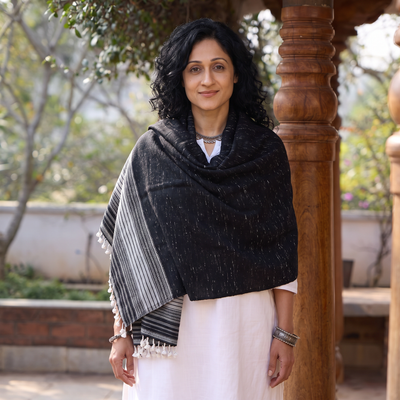 Black Kutch Bhujodi Handwoven Merino Wool Shawl, worn by a model, AI visual of the shawl, iTokri