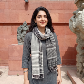 Grey Kutch Bhujodi Handwoven Merino Wool Stole, worn by a woman, AI visual of the stole, iTokri