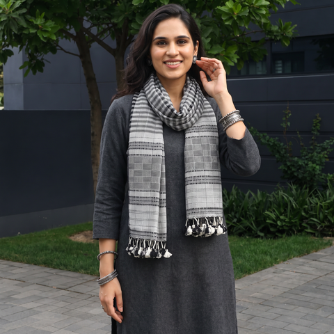 Grey Kutch Bhujodi Handwoven Merino Wool Stole, worn by a woman, AI visual of the stole, iTokri