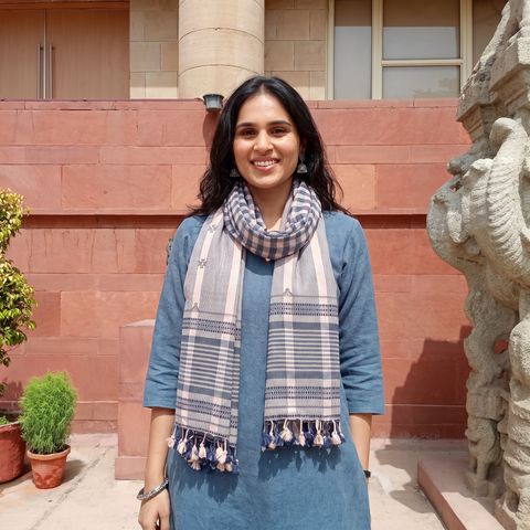 Beige Kutch Bhujodi Handwoven Merino Wool Stole, worn by a woman, AI visual of the stole, iTokri