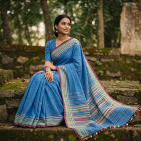 Blue Kutch Cotton Bhujodi Handloom Saree, draped and worn by a woman, AI visual of the saree, iTokri