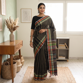 Green Kutch Cotton Bhujodi Handloom Saree, draped and worn by a woman, AI visual of the saree, iTokri