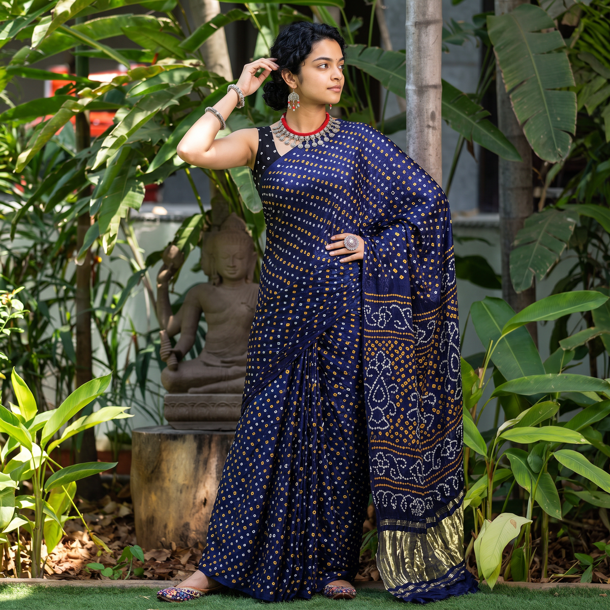 Blue Kutch dani tie-dye Gajji silk zari work Bandhani saree, draped and worn by a woman, AI visual of the saree, iTokri