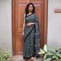 Blue Kutch Hand Block Print Natural Dyed Pure Mul Cotton Ajrakh Saree with Tassels, draped and worn by a woman, AI visual of the saree, iTokri