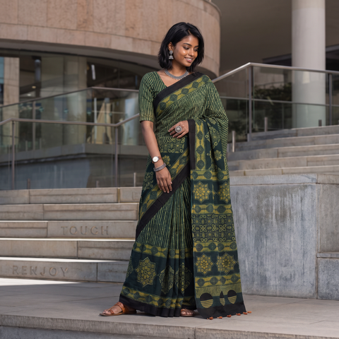 Green Kutch Hand Block Print Natural Dyed Pure Mul Cotton Ajrakh Saree with Tassels, draped and worn by a woman, AI visual of the saree, iTokri