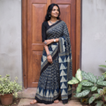 Blue Kutch Hand Block Print Natural Dyed Pure Mul Cotton Ajrakh Saree with Tassels, draped and worn by a woman, AI visual of the saree, iTokri