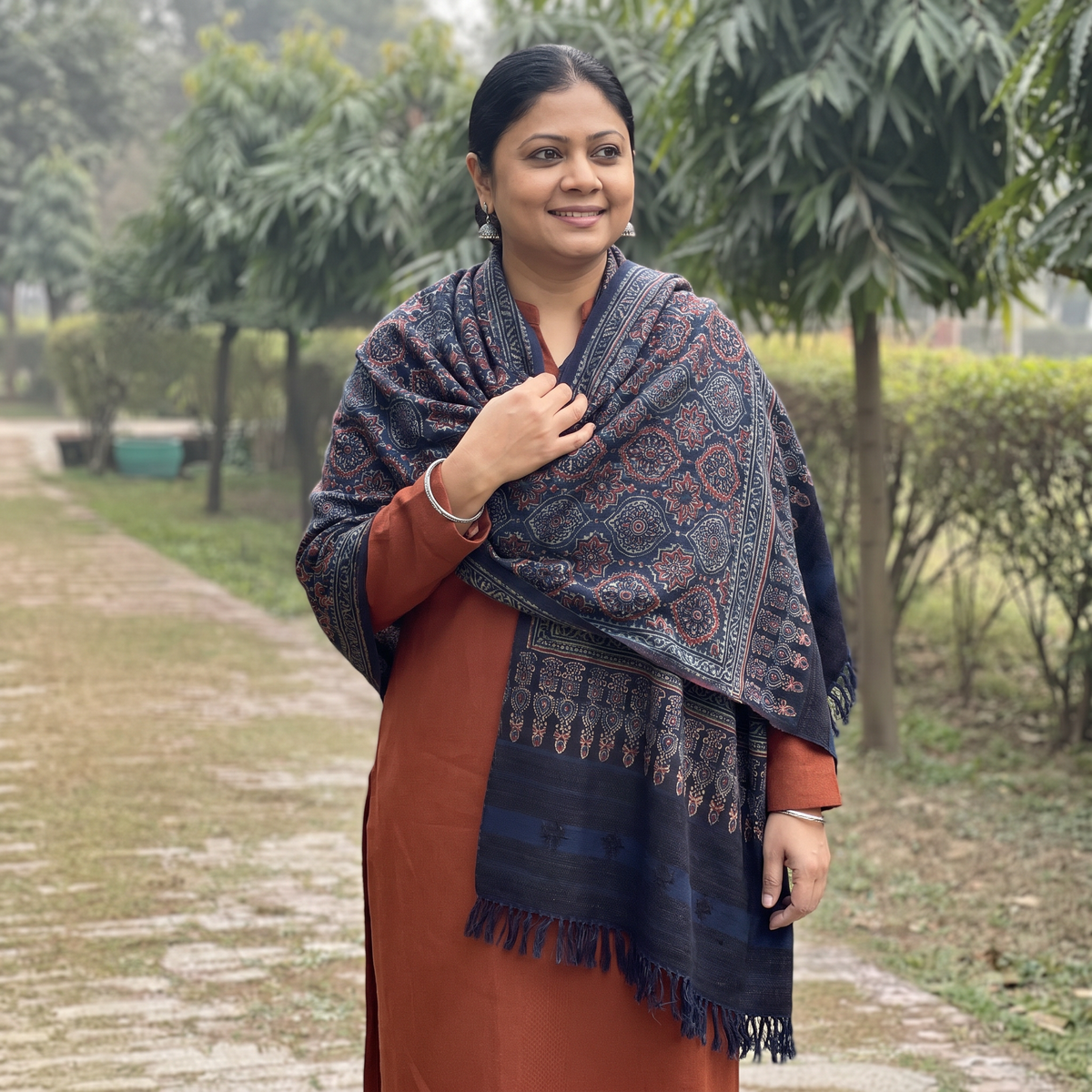 Blue Kutch Handwoven Ajrakh Hand Block Print Merino Wool Shawl, worn by a model, AI visual of the shawl, iTokri