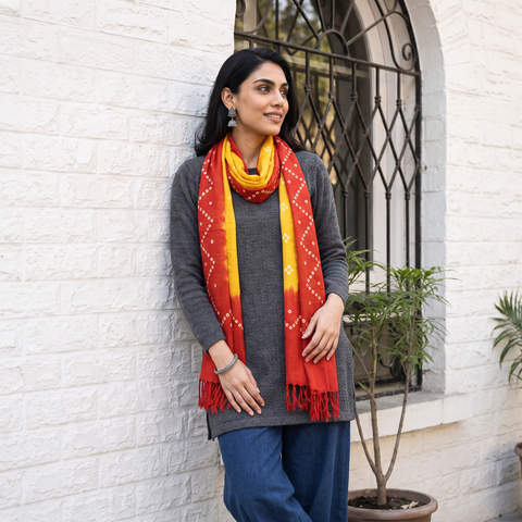 Orange Kutch Handwoven Bagida Merino Wool Bandhani Stole, worn by a woman, AI visual of the stole, iTokri