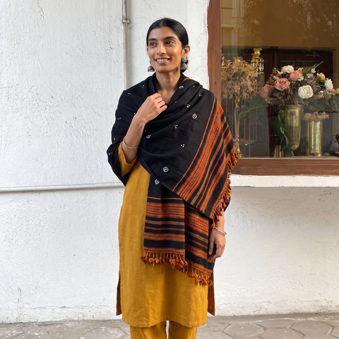 Black Kutch Handwoven Bandhani Merino Wool Shawl, worn by a model, AI visual of the shawl, iTokri