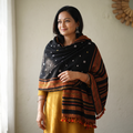Black Kutch Handwoven Bandhani Merino Wool Shawl, worn by a model, AI visual of the shawl, iTokri