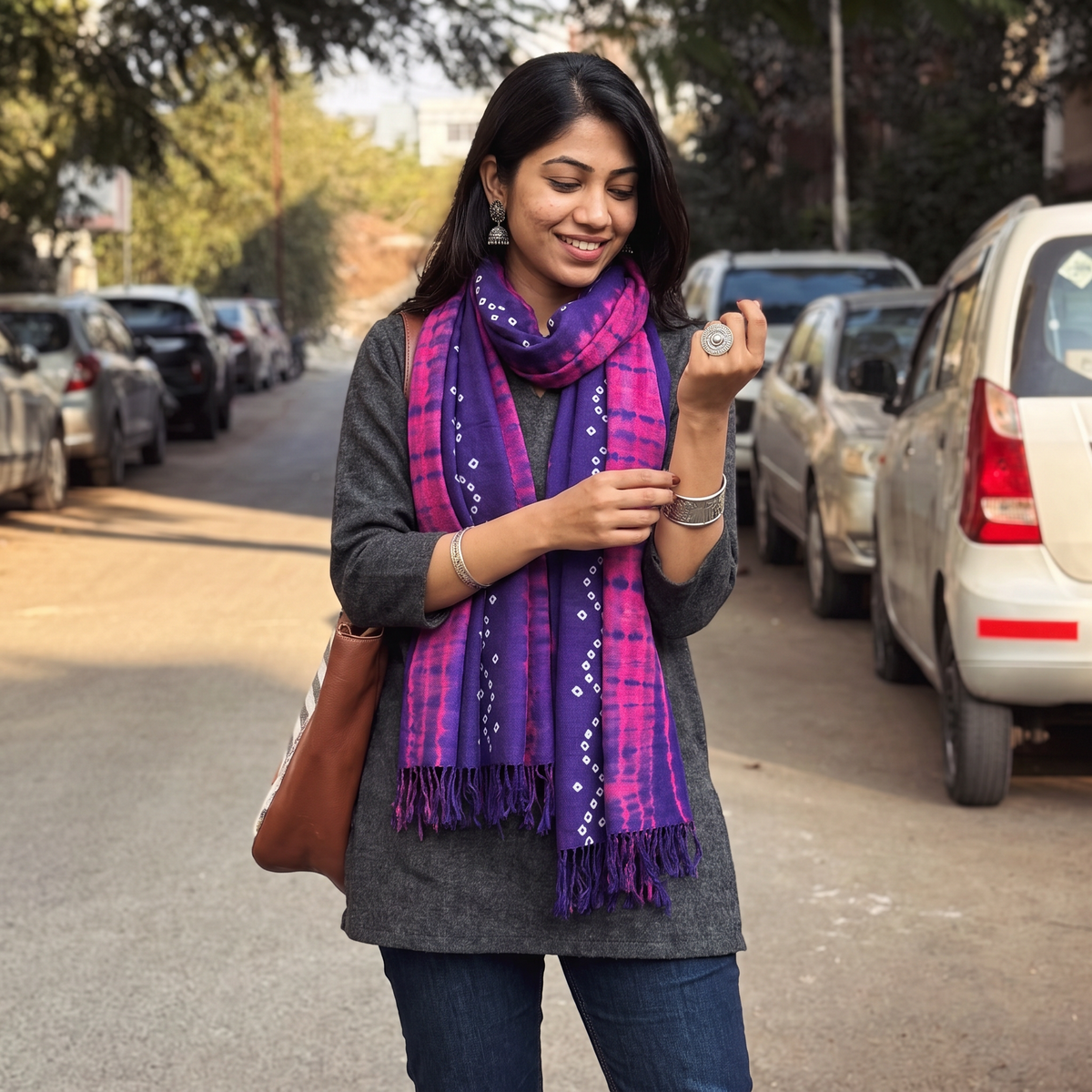 Pink Kutch Handwoven Bandhani & Shibori Merino Woolen Stole, worn by a woman, AI visual of the stole, iTokri