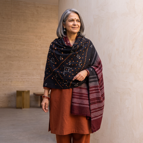 Black Kutch Handwoven Bandhani Tie-Dye Merino Wool Shawl, worn by a model, AI visual of the shawl, iTokri