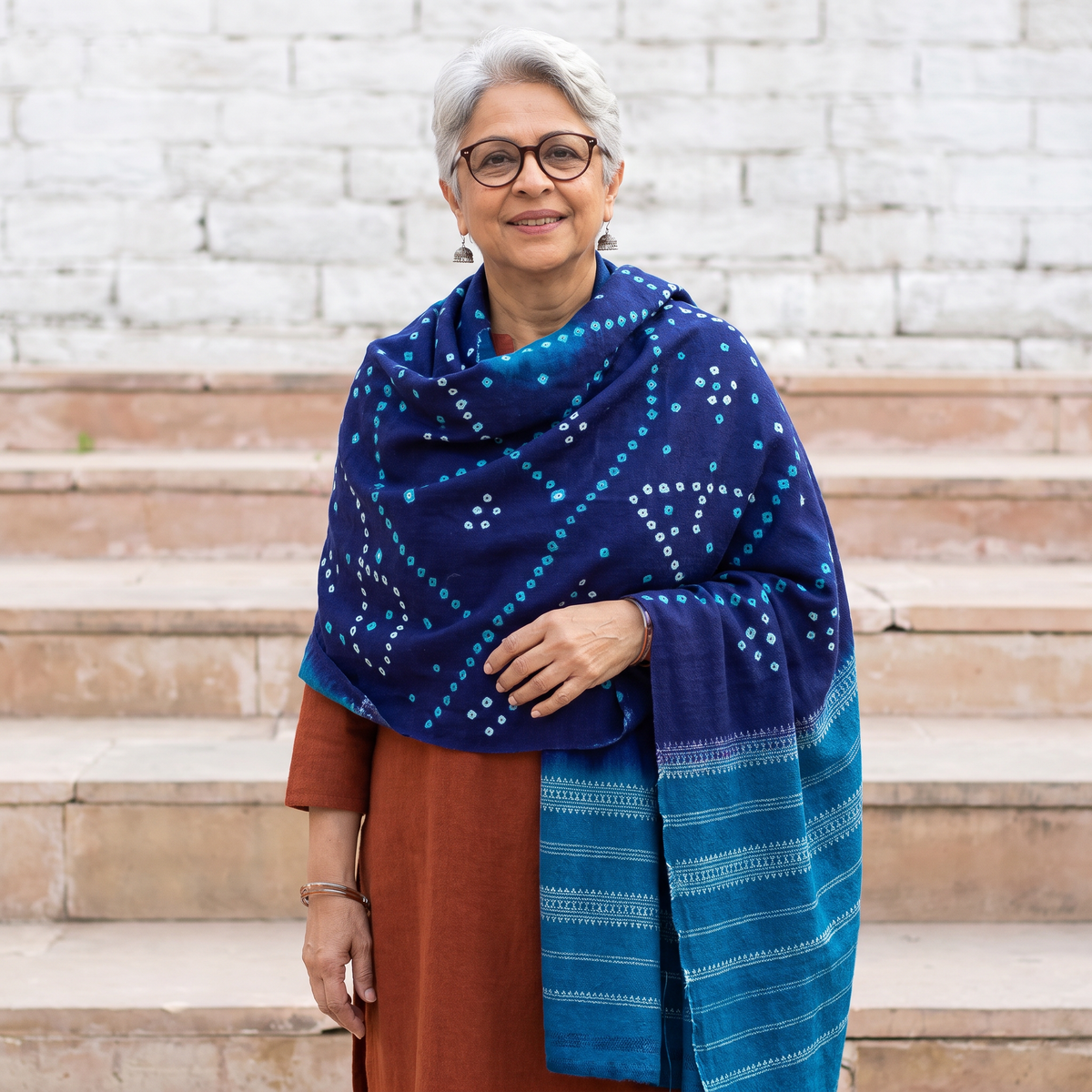 Blue Kutch Handwoven Bandhani Tie-Dye Merino Wool Shawl, worn by a model, AI visual of the shawl, iTokri