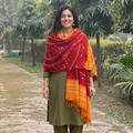 Red Kutch Handwoven Bandhani Tie-Dye Merino Wool Shawl, worn by a model, AI visual of the shawl, iTokri