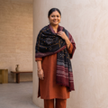 Black Kutch Handwoven Bandhani Tie-Dye Merino Wool Shawl, worn by a model, AI visual of the shawl, iTokri