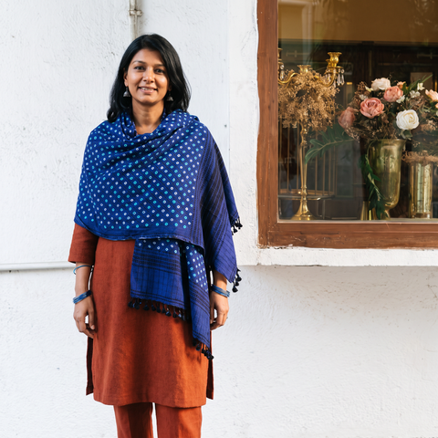 Blue Kutch Handwoven Clamp Dyed Checks Bandhani Merino Wool Shawl, worn by a model, AI visual of the shawl, iTokri
