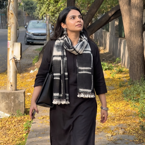 Black Kutch Handwoven Clamp Dyed Merino Wool x Katia Silk Shibori Stole, worn by a woman, AI visual of the stole, iTokri