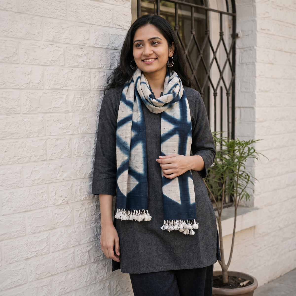 Blue Kutch Handwoven Clamp Dyed Merino Wool x Katia Silk Shibori Stole, worn by a woman, AI visual of the stole, iTokri