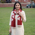 Red Kutch Handwoven Clamp Dyed Merino Wool x Katia Silk Shibori Stole, worn by a woman, AI visual of the stole, iTokri
