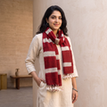 Red Kutch Handwoven Clamp Dyed Merino Wool x Katia Silk Shibori Stole, worn by a woman, AI visual of the stole, iTokri