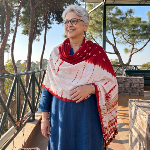 Red Kutch Handwoven Clamp Dyed Shibori Desi Wool Shawl, worn by a model, AI visual of the shawl, iTokri