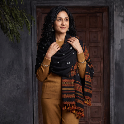 Black Kutch Handwoven Clamp Dyed Shibori Desi Wool Shawl, worn by a model, AI visual of the shawl, iTokri