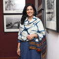 White Kutch Handwoven Clamp Dyed Shibori Merino Wool Shawl, worn by a model, AI visual of the shawl, iTokri