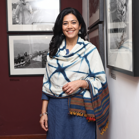 White Kutch Handwoven Clamp Dyed Shibori Merino Wool Shawl, worn by a model, AI visual of the shawl, iTokri