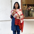 White Kutch Handwoven Clamp Dyed Shibori Merino Wool Shawl, worn by a model, AI visual of the shawl, iTokri