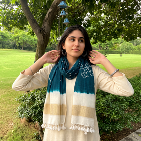 Green Kutch Handwoven Merino Wool Bandhani Stole with Zari, worn by a woman, AI visual of the stole, iTokri