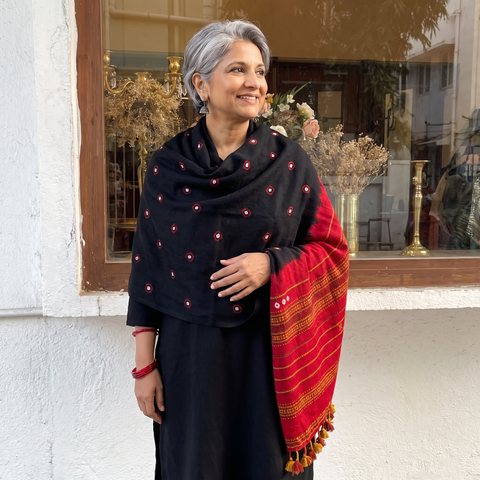 Black Kutch Handwoven Merino Wool Bandhani Tie-Dye Shawl, worn by a model, AI visual of the shawl, iTokri