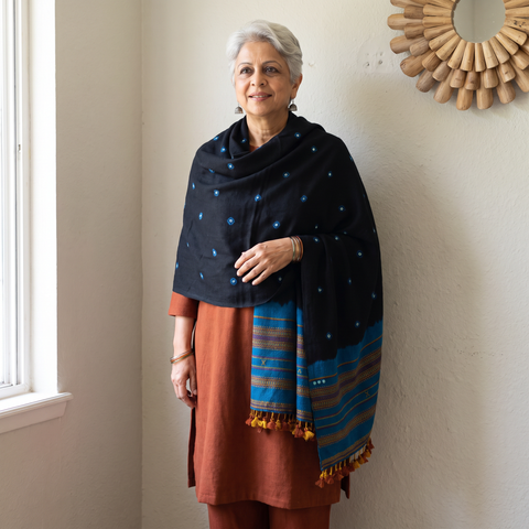 Black Kutch Handwoven Merino Wool Bandhani Tie-Dye Shawl, worn by a model, AI visual of the shawl, iTokri