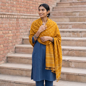 Yellow Kutch Handwoven Merino Wool Bandhani Tie-Dye Shawl, worn by a model, AI visual of the shawl, iTokri