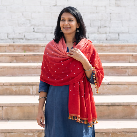 Red Kutch Handwoven Merino Wool Bandhani Tie-Dye Shawl, worn by a model, AI visual of the shawl, iTokri