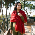 Red Kutch Handwoven Merino Wool Bandhani Tie-Dye Shawl, worn by a model, AI visual of the shawl, iTokri