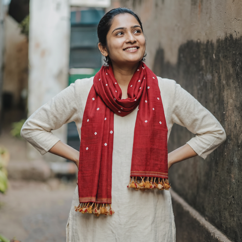 Red Kutch Handwoven Merino Wool Bandhani Tie-Dye Stole, worn by a woman, AI visual of the stole, iTokri