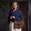 Blue Kutch Handwoven Merino Wool Dhabla Shawl, worn by a model, AI visual of the shawl, iTokri