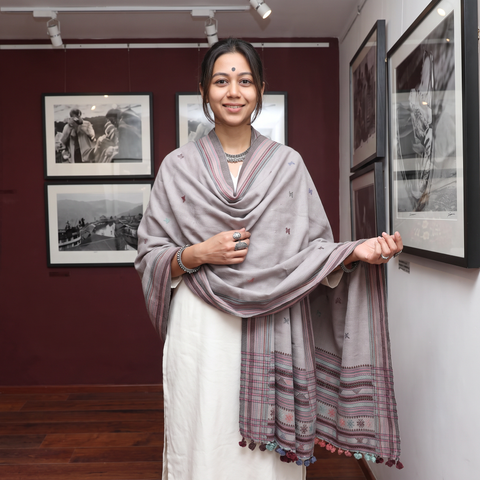 Grey Kutch Handwoven Merino Wool Dhabla Shawl, worn by a model, AI visual of the shawl, iTokri