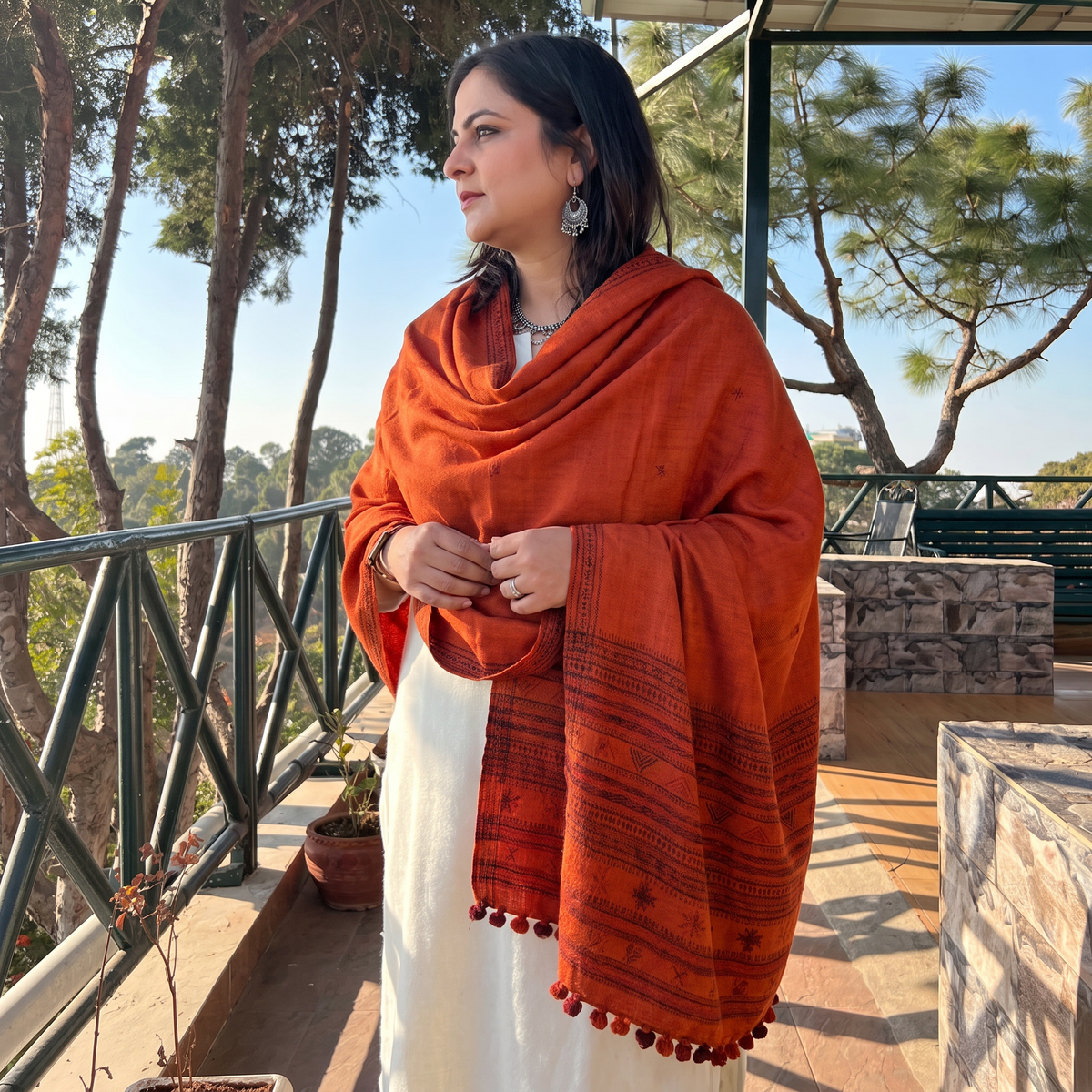 Orange Kutch Handwoven Merino Wool Dhabla Shawl, worn by a model, AI visual of the shawl, iTokri