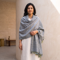 Grey Kutch Handwoven Merino Wool Shawl, worn by a model, AI visual of the shawl, iTokri